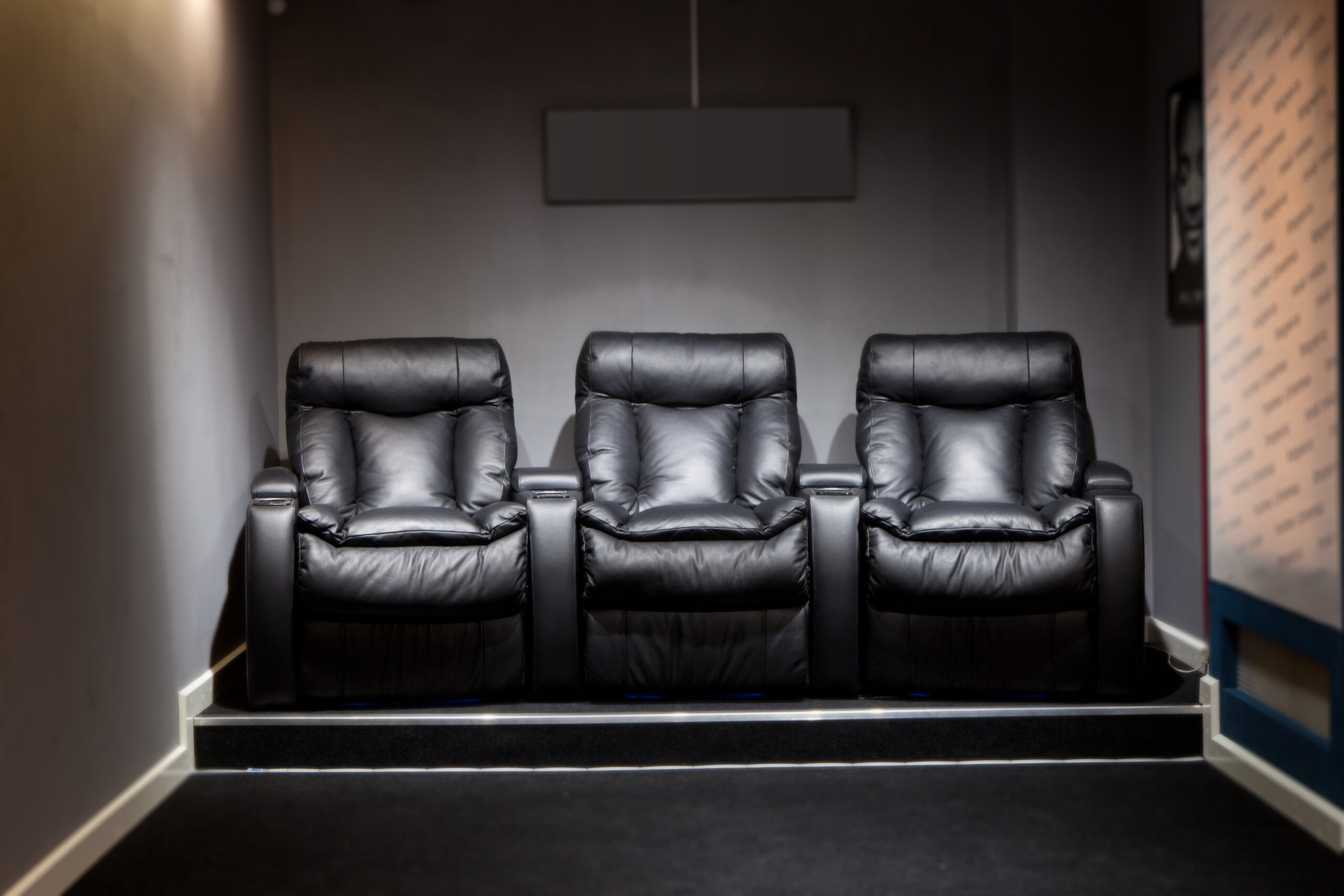 Leather armchairs in home cinema dedicated home theater